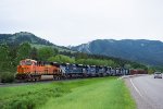 BNSF 6712 leads a westbound ballast train off Bozeman Pass